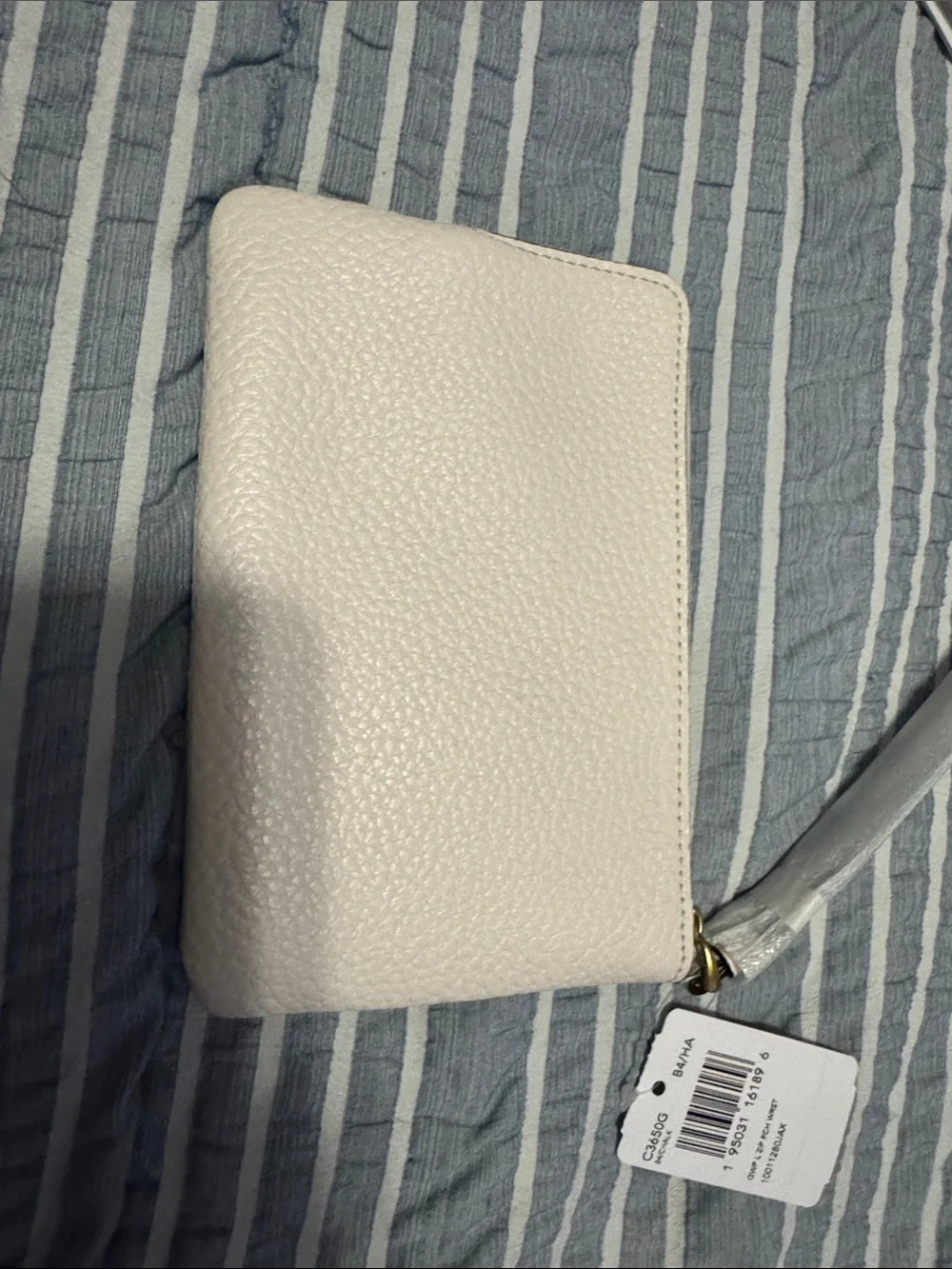 COACH Cream Pebbled Leather Wristlet Clutch with Gold Logo
